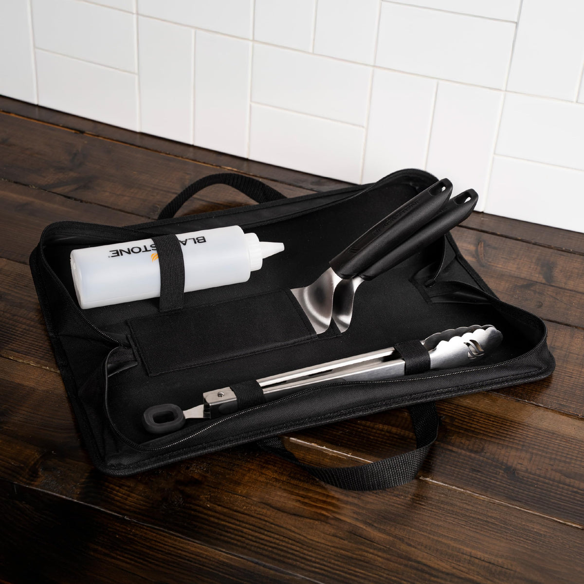 Blackstone 5481 squeeze bottle enables precise oiling and cleaning across the griddle.