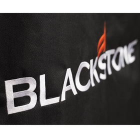 Close-up of cinch straps securing the BLACKSTONE 5482 cover