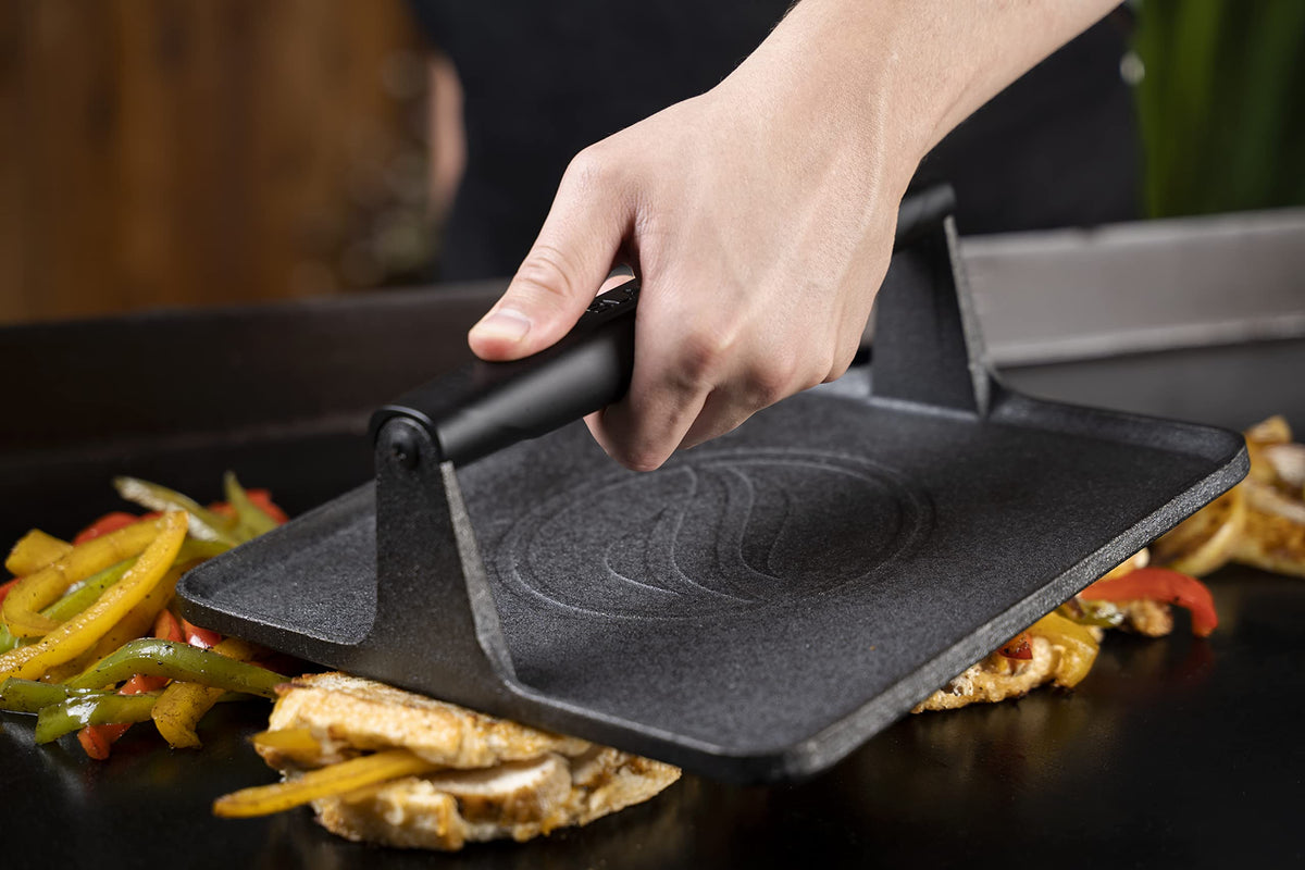 Blackstone 5554 griddle press with heat-resistant handle for a secure, slip-free grip