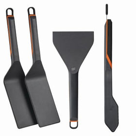 Blackstone 8202 E-Series tool kit in use, showing beveled-edge spatula for precise lifting.
