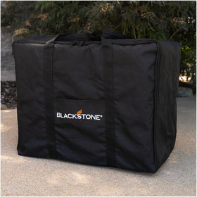 BLACKSTONE table top griddle carry bag with strap demonstrates easy lifting and secure transport.