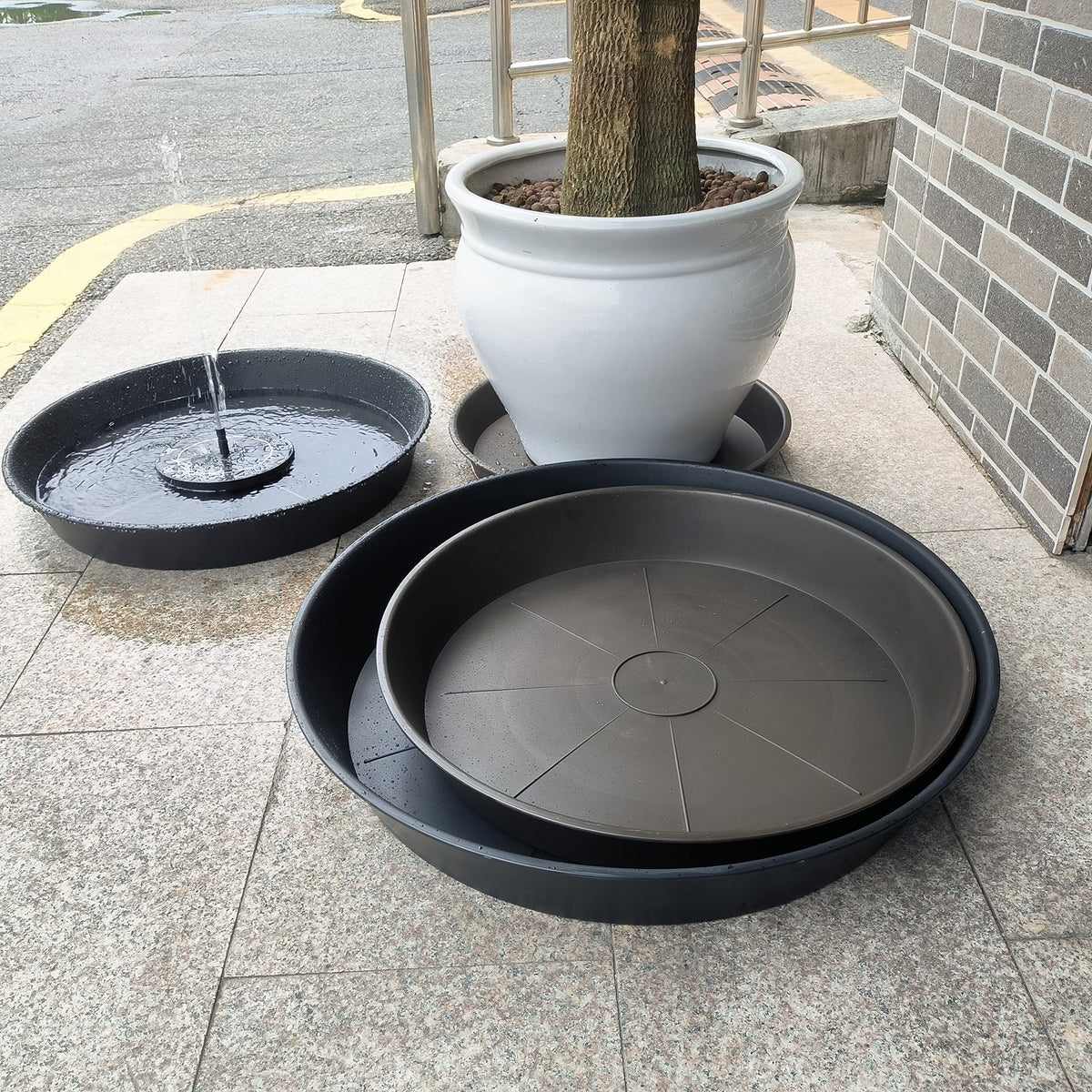 Bleuhome brown matte finish plant saucer blends with decor.