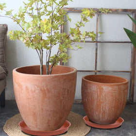 Bleuhome indoor-outdoor use under pot — catches overflow for versatile spaces.