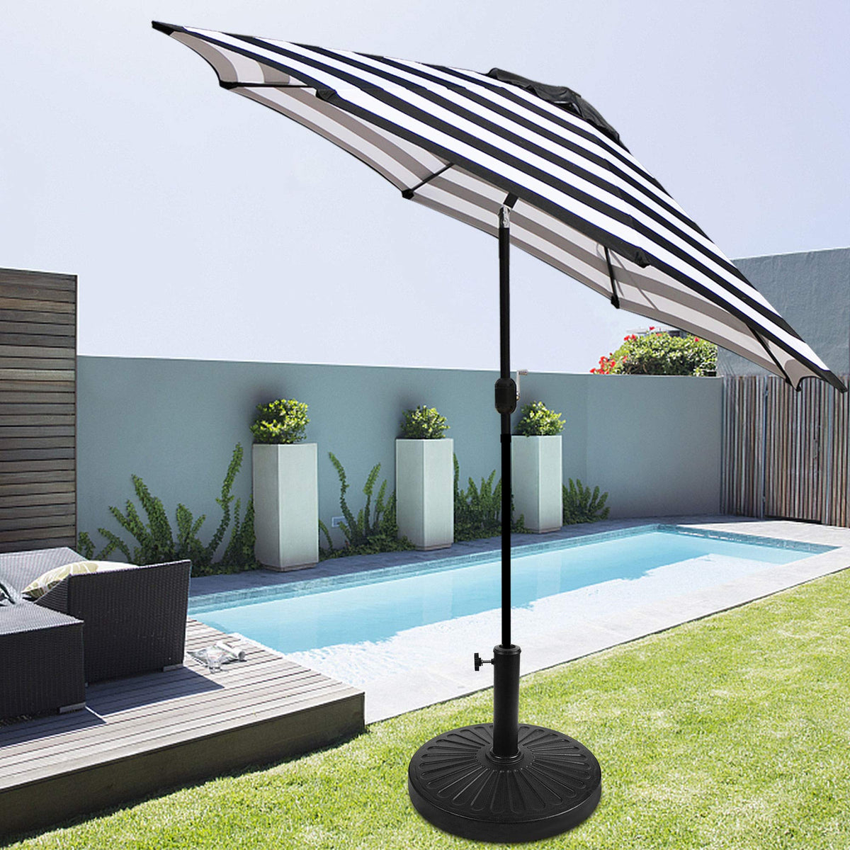 Blissun umbrella base in use on a patio for stable shading.