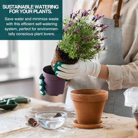 Blumat Classic stake releasing water automatically with siphon action.