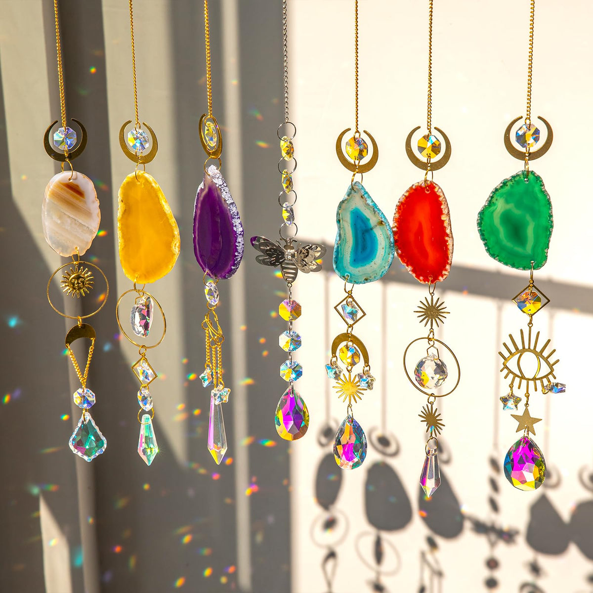 BlumWay 7-pcs crystal suncatchers set catching rainbows in sunlight indoors