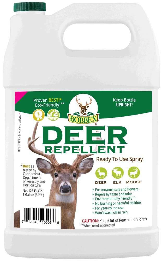Bobbex deer repellent refill bottle pouring to protect your garden from deer