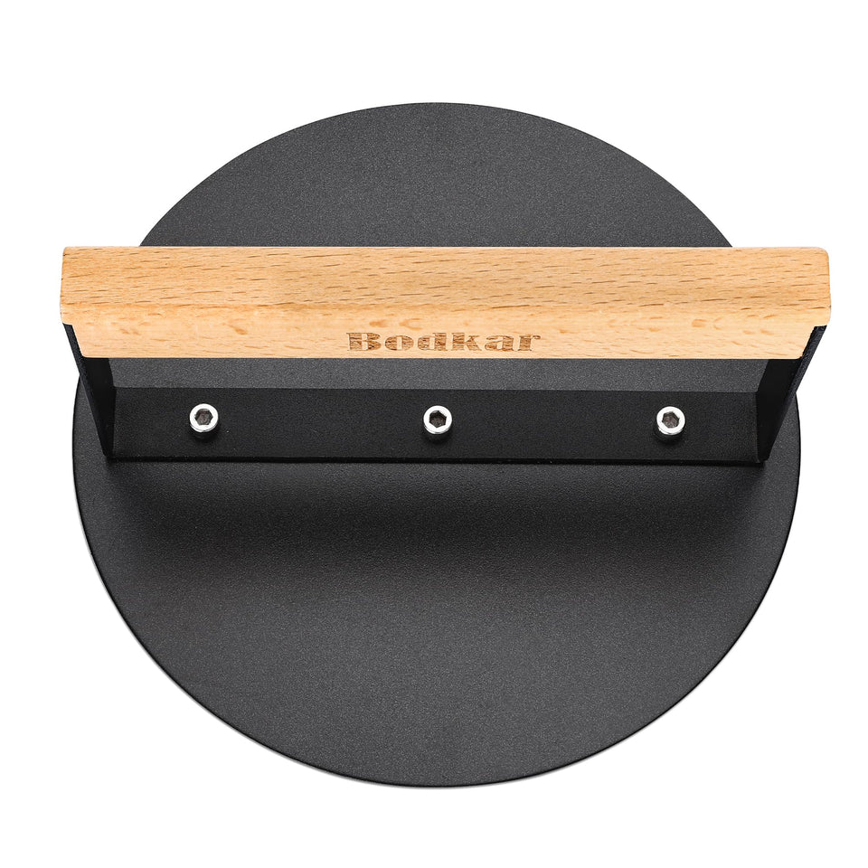 bodkar 6-inch smash burger press for even-thickness burgers on a skillet