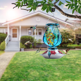 Bolite hummingbird feeder with ant moat keeps nectar ants-free.