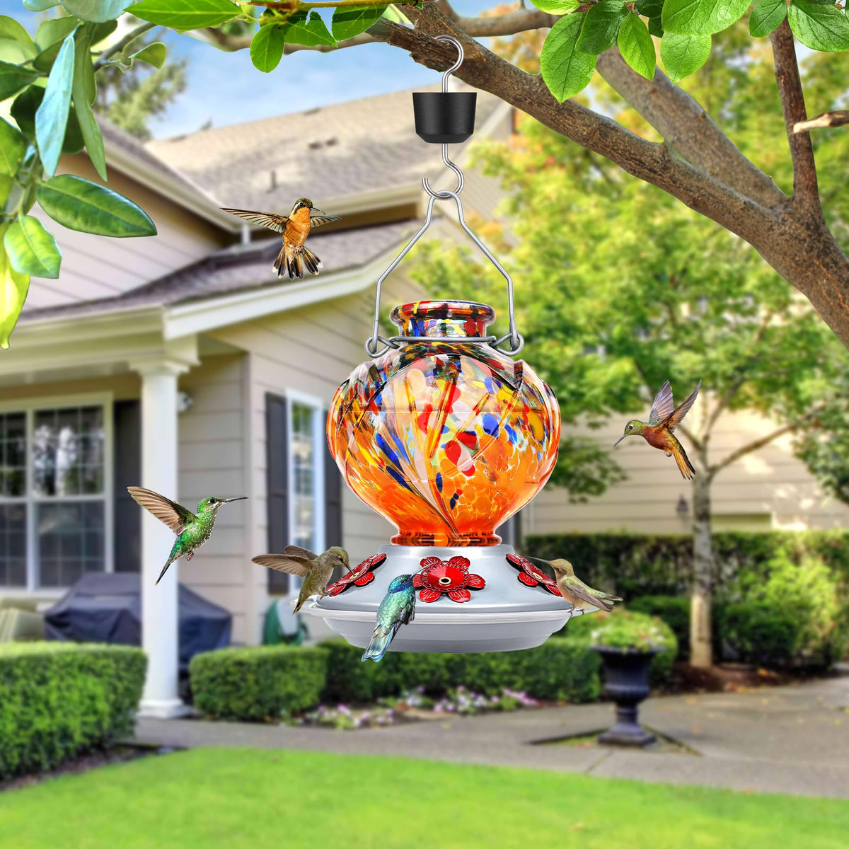 Bolite hummingbird feeder close-up reveals vivid orange peony glass for garden interest.