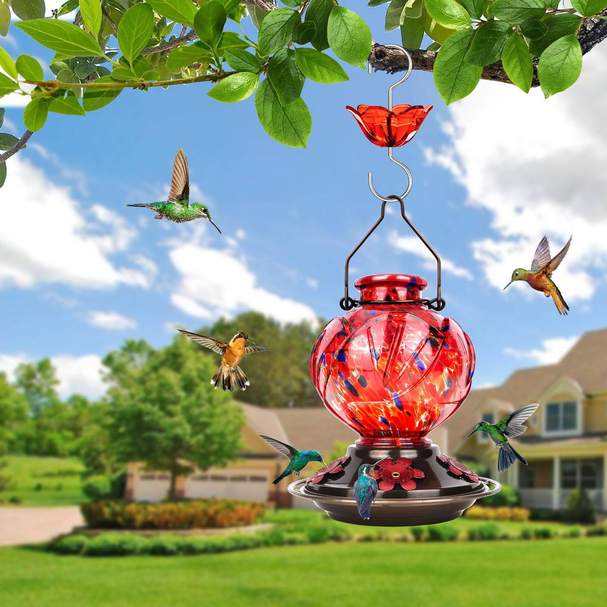Hand-blown red glass and petals brighten outdoor spaces for nature watching.