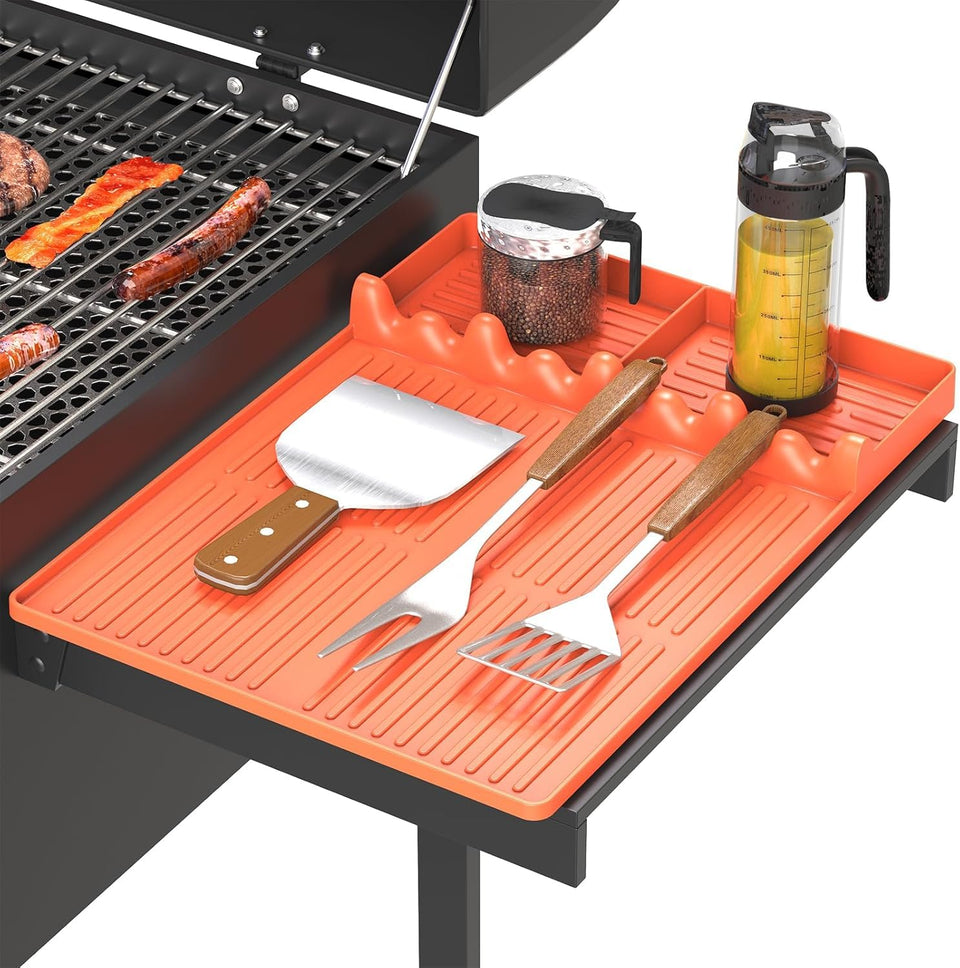 Bolycen silicone griddle tool mat orange on grill keeps utensils within reach.