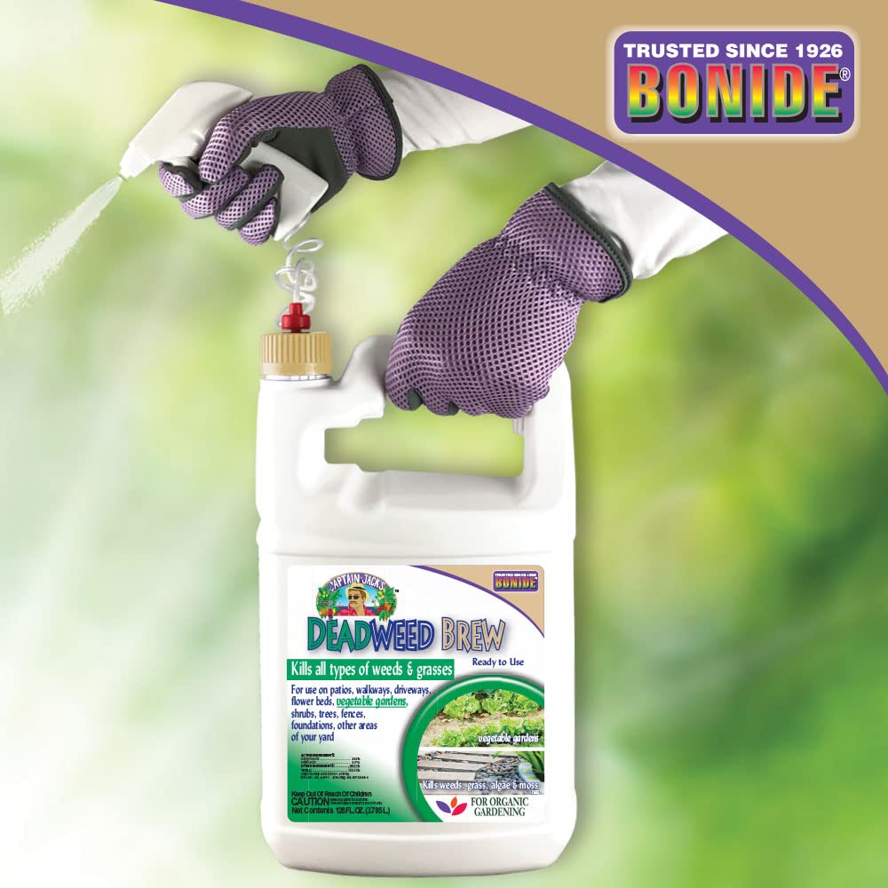 Bonide Captain Jack's Deadweed Brew used along a driveway edge to manage weeds.