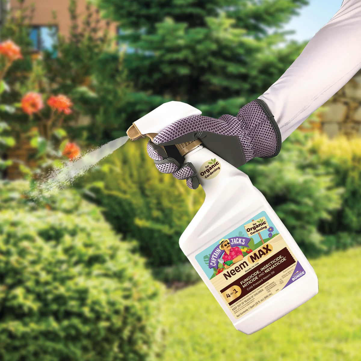 Bonide Captain Jack's Neem Max spray-in-use demonstrates versatile 4-in-1 protection.