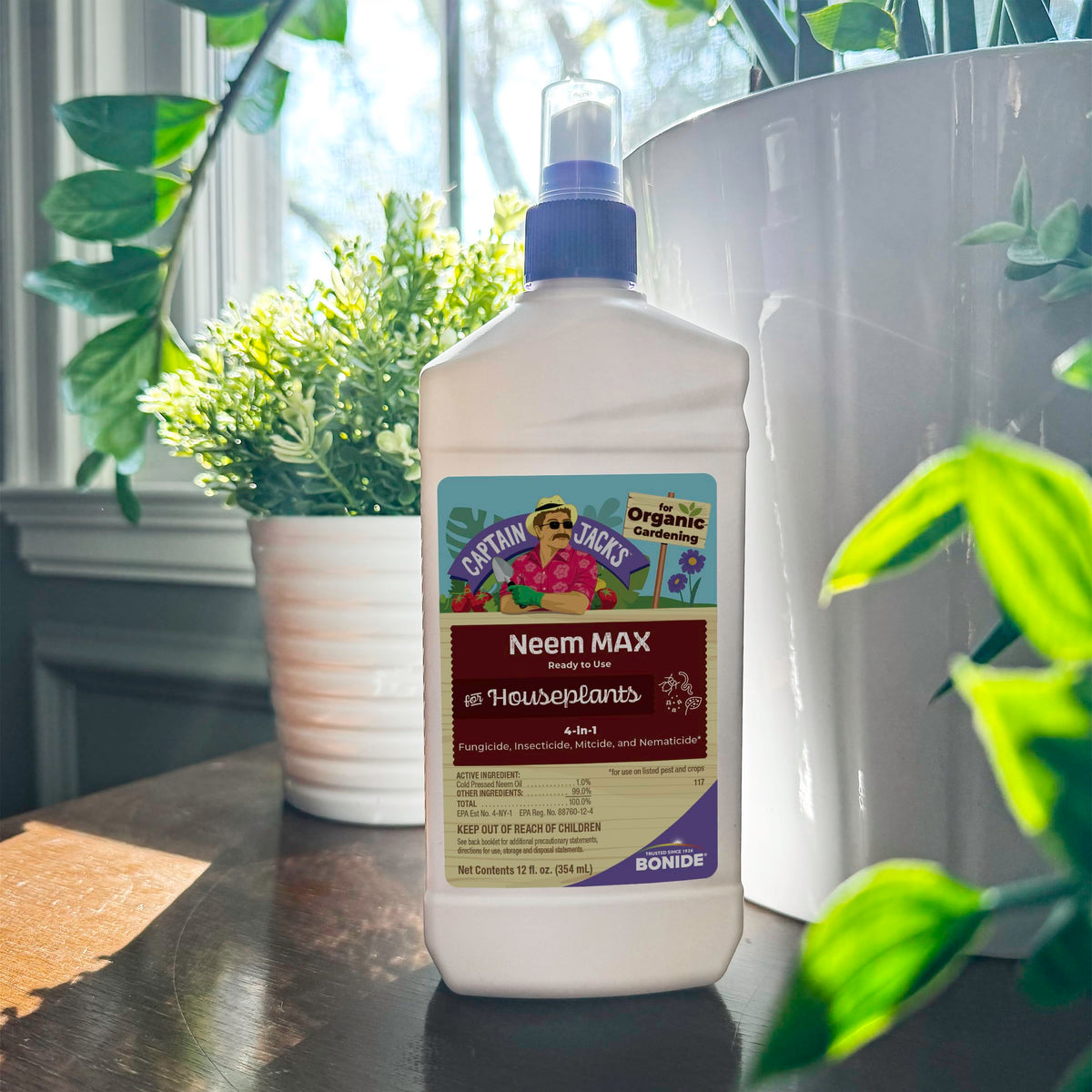 Neem Max spray on plants protects against pests.