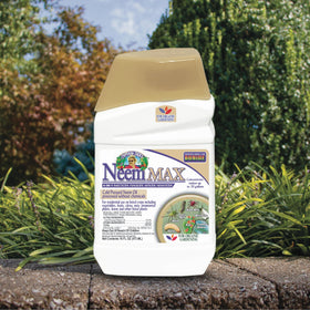 NeemMax concentrate being poured, ready for mixing to protect plants naturally.