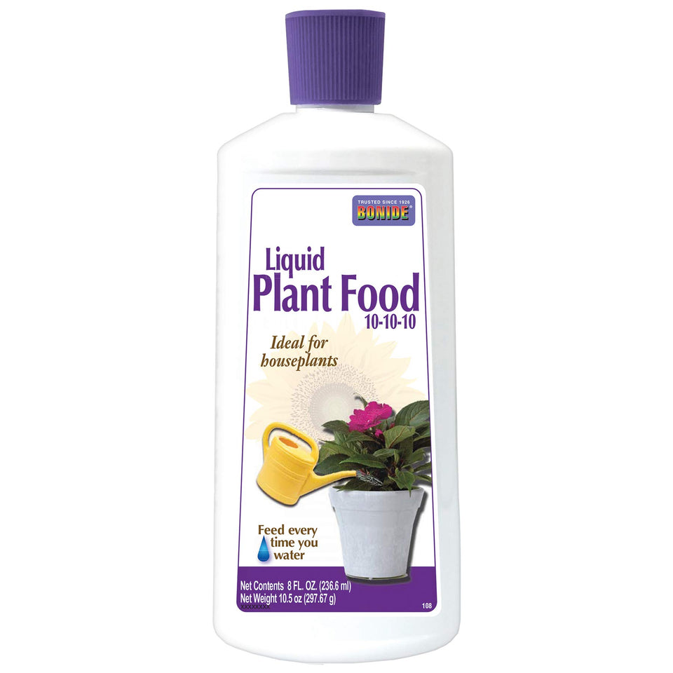 Bonide Liquid Plant Food bottle being poured to nourish indoor houseplants.