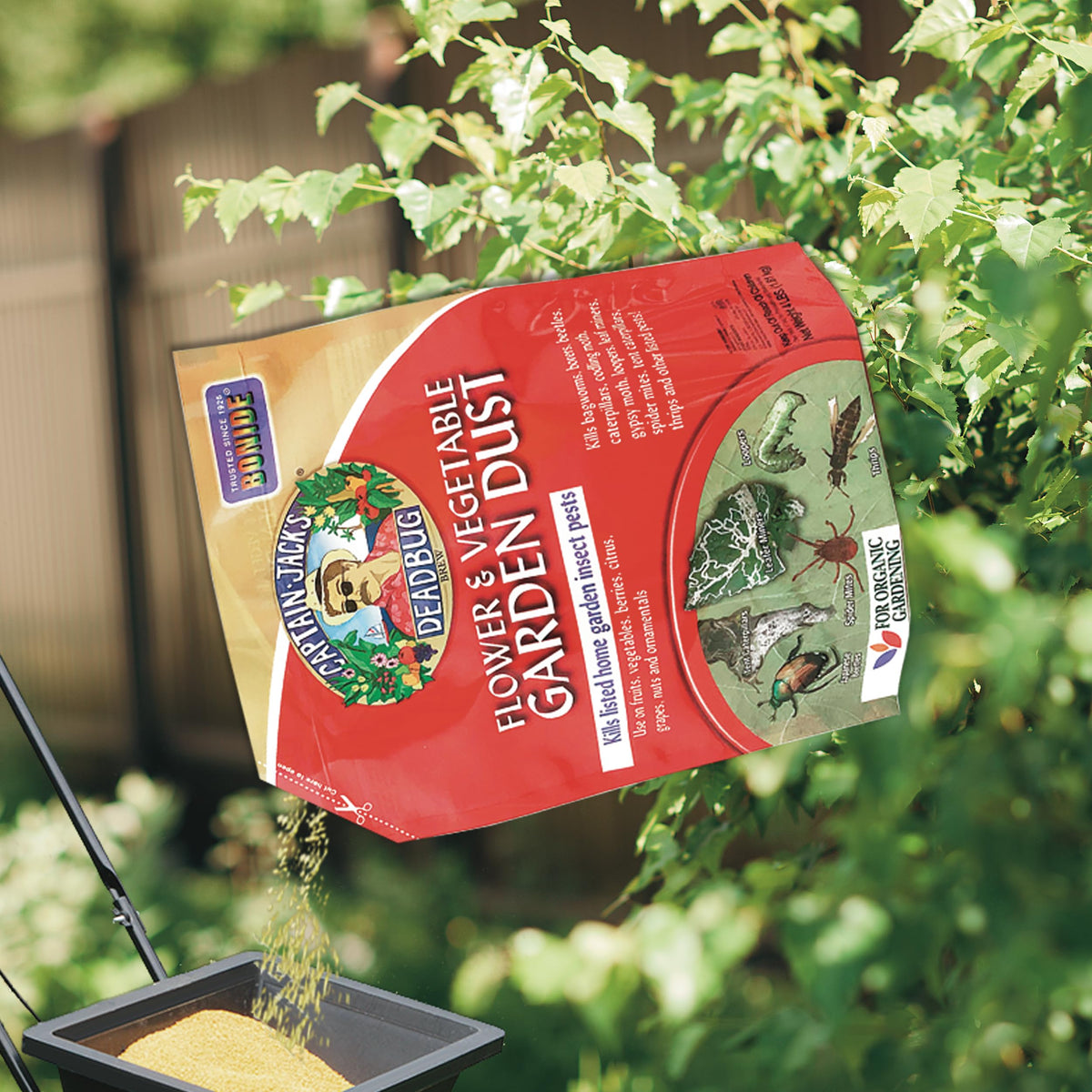 Lawn and garden pest control dust applied to a bed
