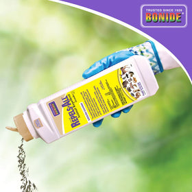 Bonide Repels-All deters deer and squirrels from garden beds.