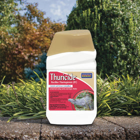 Bonide Thuricide BT bottle in garden ready for organic pest protection