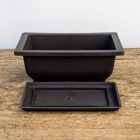 Bonsai Outlet stackable pots for easy transport and storage.