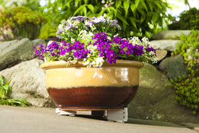 Bosmere Pot Toes level uneven surfaces for stable planting.