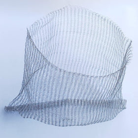 boUod gopher basket protecting plant crowns and roots in a garden bed