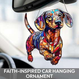 Boyese dachshund suncatcher on a tree branch brings playful seasonal charm.