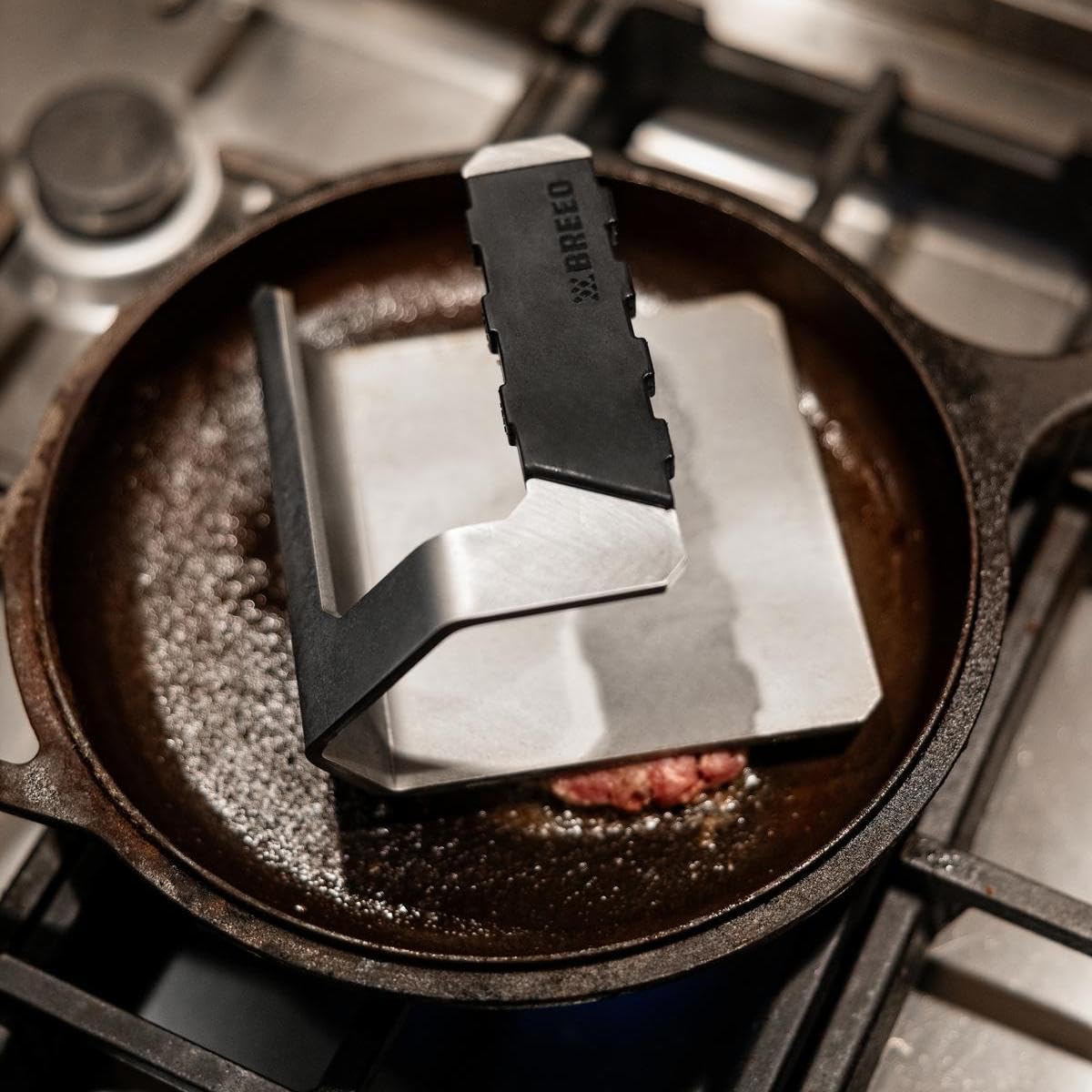 Breeo Griddle Press features a weighted surface for even burgers.