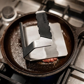 Breeo Griddle Press features a weighted surface for even burgers.
