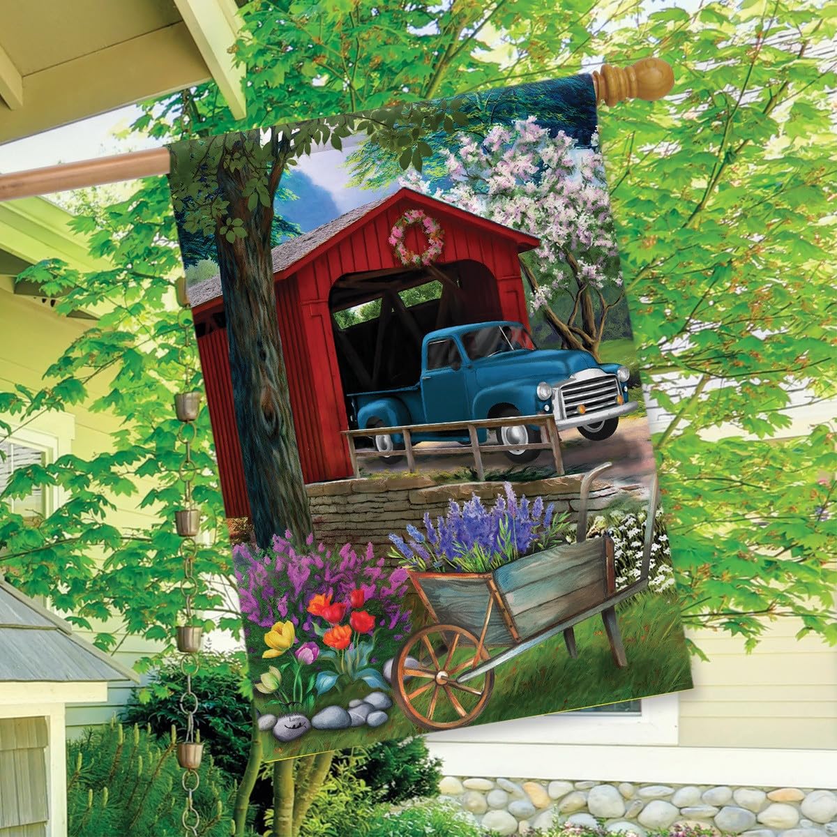 Briarwood Lane Bridge Blooms Spring flag double-sided image visible from both sides.