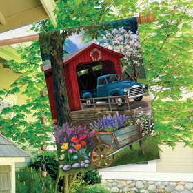 Briarwood Lane Bridge Blooms Spring flag double-sided image visible from both sides.