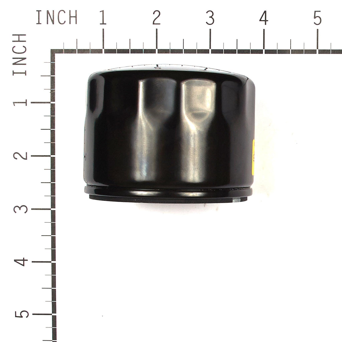 Briggs & Stratton 842921 close-up of the oil filter for precise fit inspection.