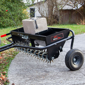 Brinly transport-wheels-10-inch allow easy cross-driveway movement.