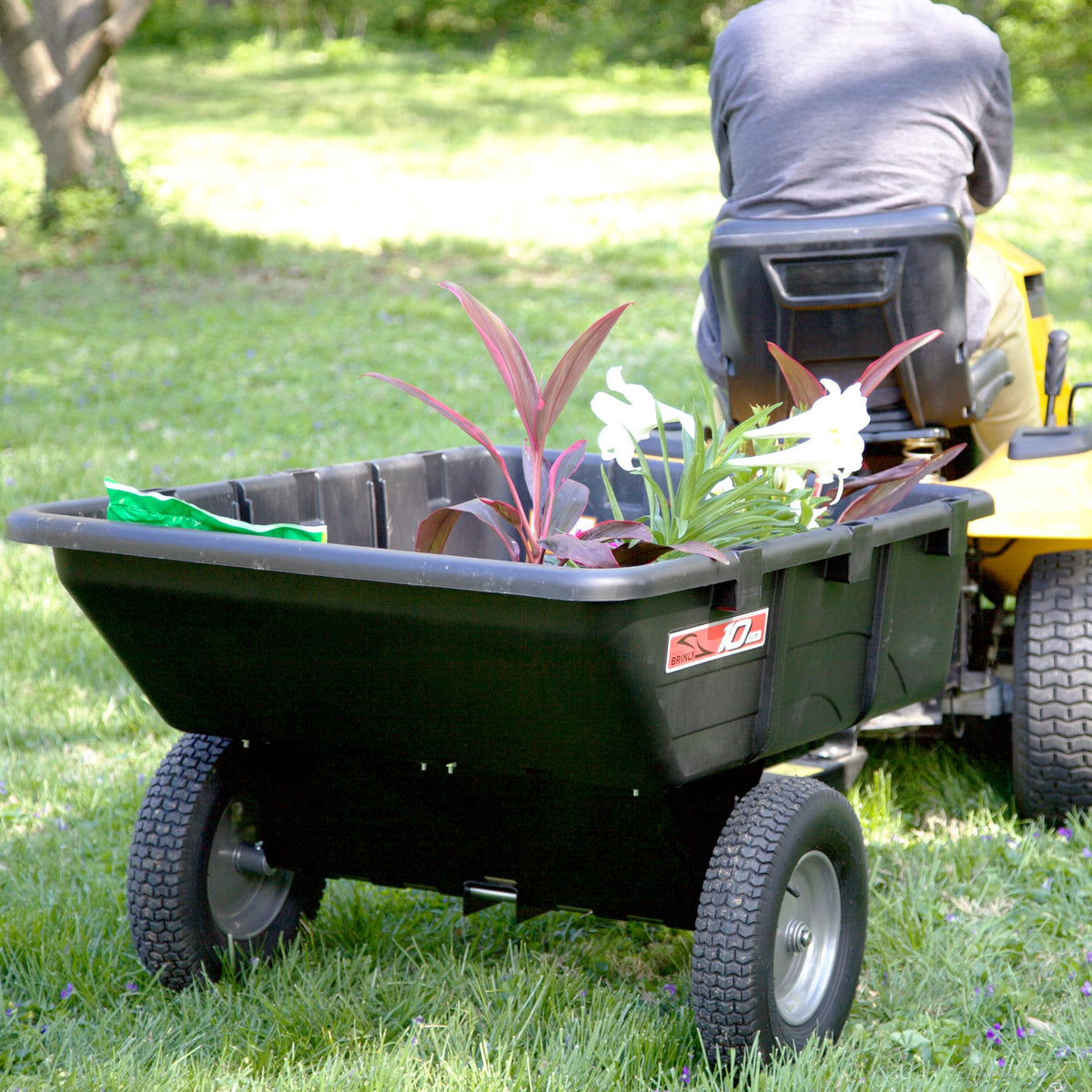 Brinly universal hitch with magnetic pin attaches to machines easily.