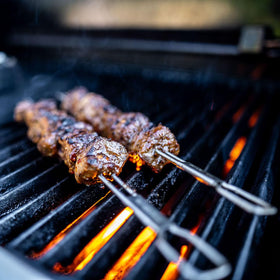 Broil King 12-inch skewers with spin-proof design for even grilling.