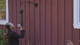 Brome Squirrel Solution 150 feeder, side view with perches for small birds.