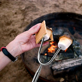 BRIOUT roasting sticks with multicolor handles for easy sharing during s'mores.
