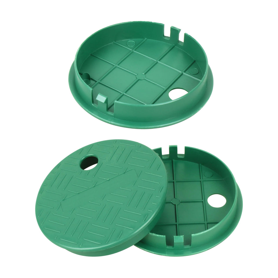 Buccilly 6-inch round valve box cover installed on green lawn protects irrigation valves.