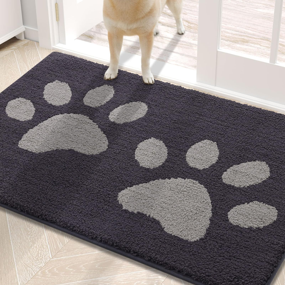 Buganda dog door mat with muddy paws trapping dirt at entry to keep floors clean