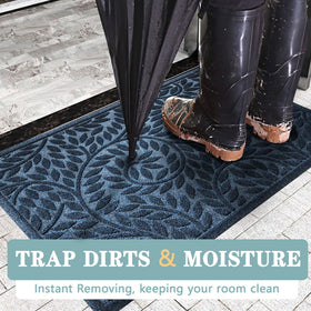 Bulijojo mat with patterned grooves scrapes dirt from shoes before indoor entry.