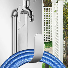 BunnyCare hose storage on faucet keeps hoses ready for watering tasks.