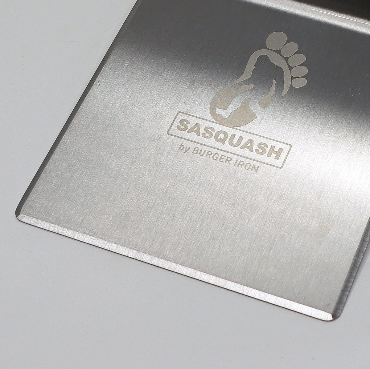Burger Iron Sasquash spatula built from knife-grade steel for durability.
