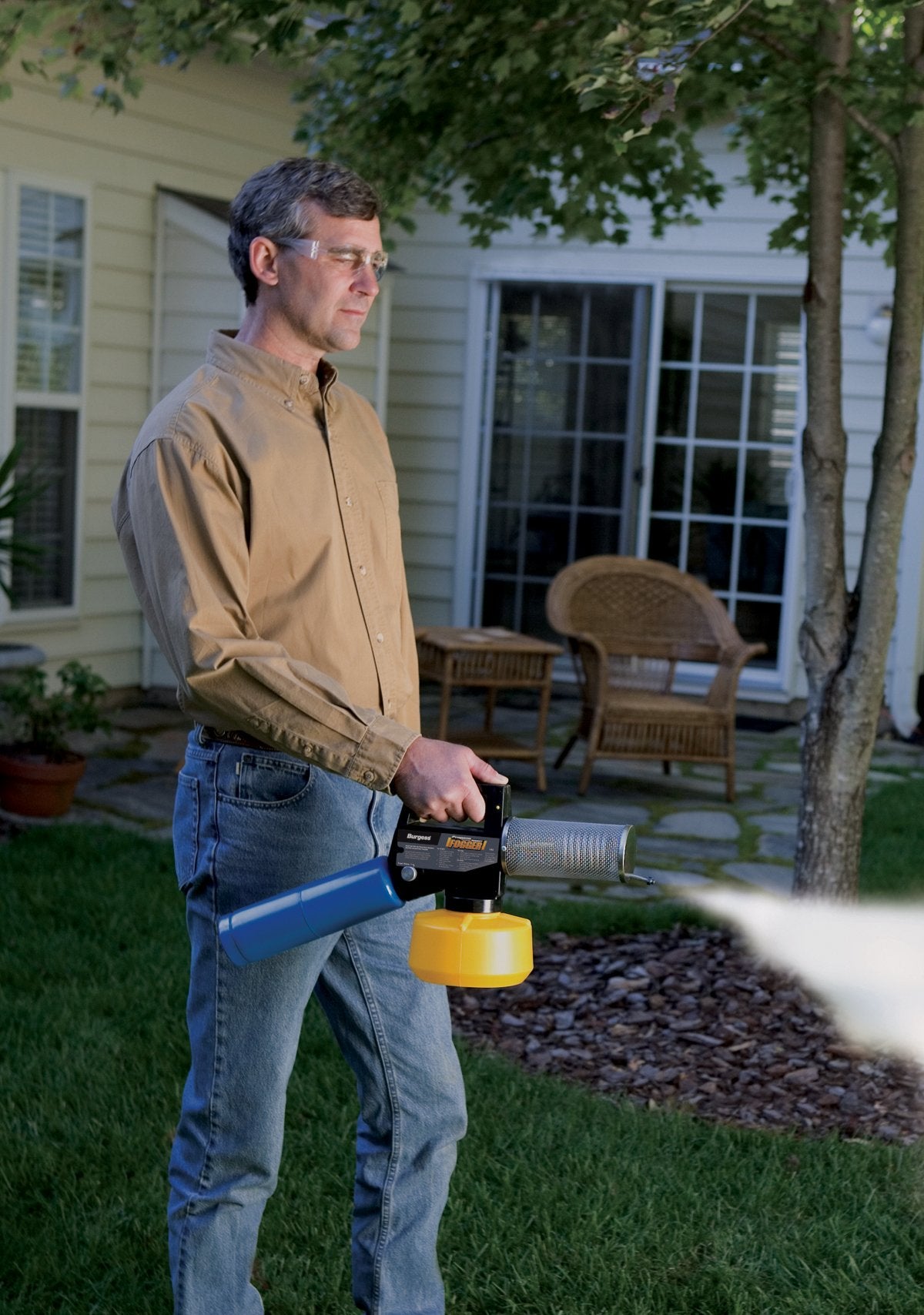 Burgess 1443 positioned beside a grill for pre-event protection.