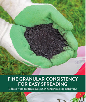 Burpee Organic Rose Bloom granular spread on soil distributes nutrients evenly.