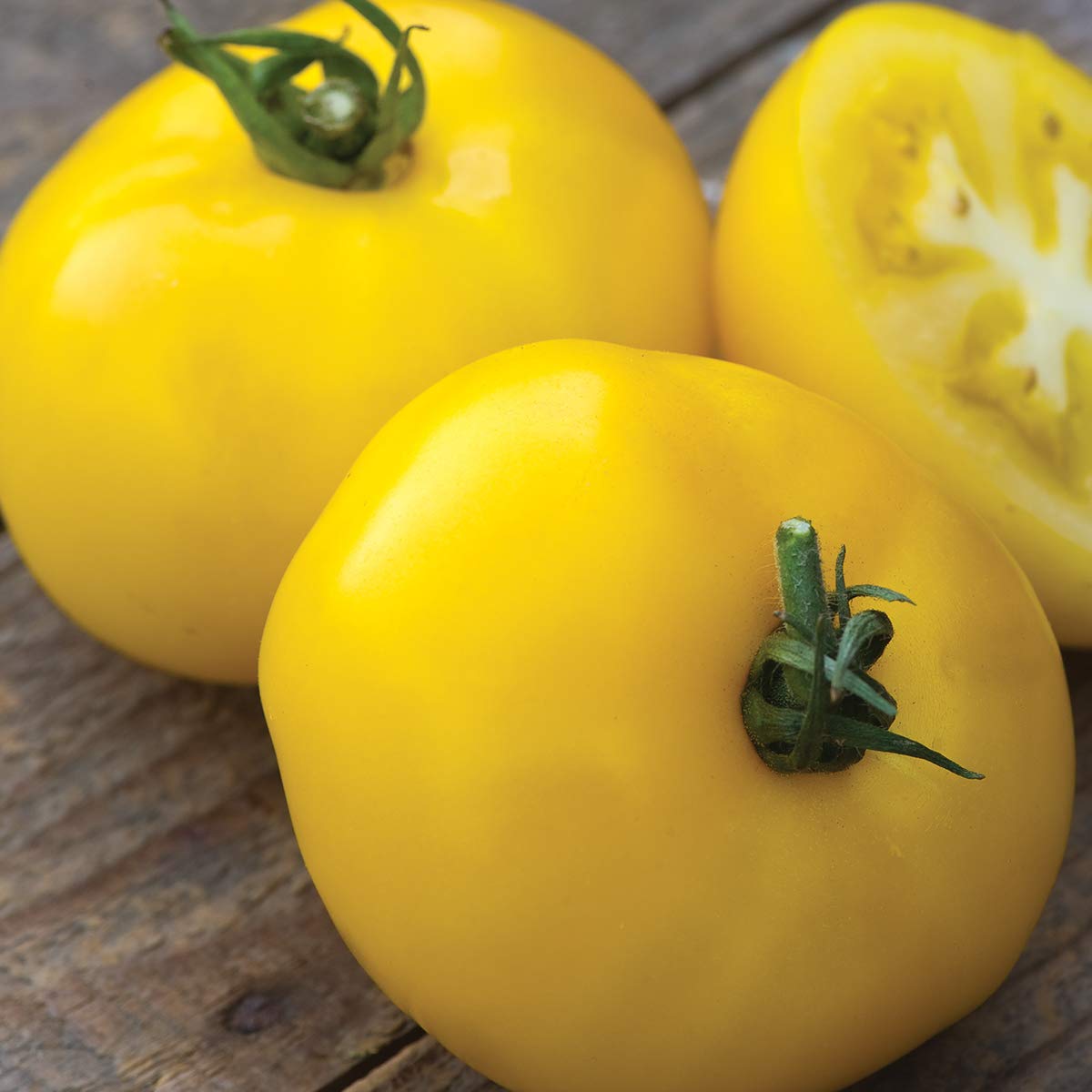 Burpee Sunny Boy plant grows tall vines up to 52 inches, ready for staking.