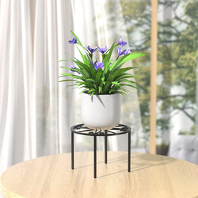 Bussdis plant stand doubles as a display stand for decor items.