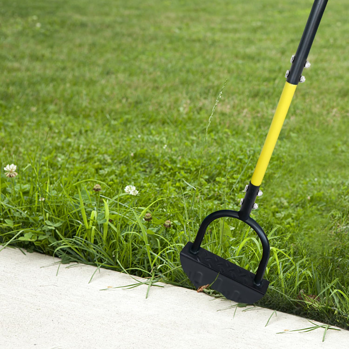 Byhagern multi-purpose edger used along driveways, sidewalks, and flower beds.