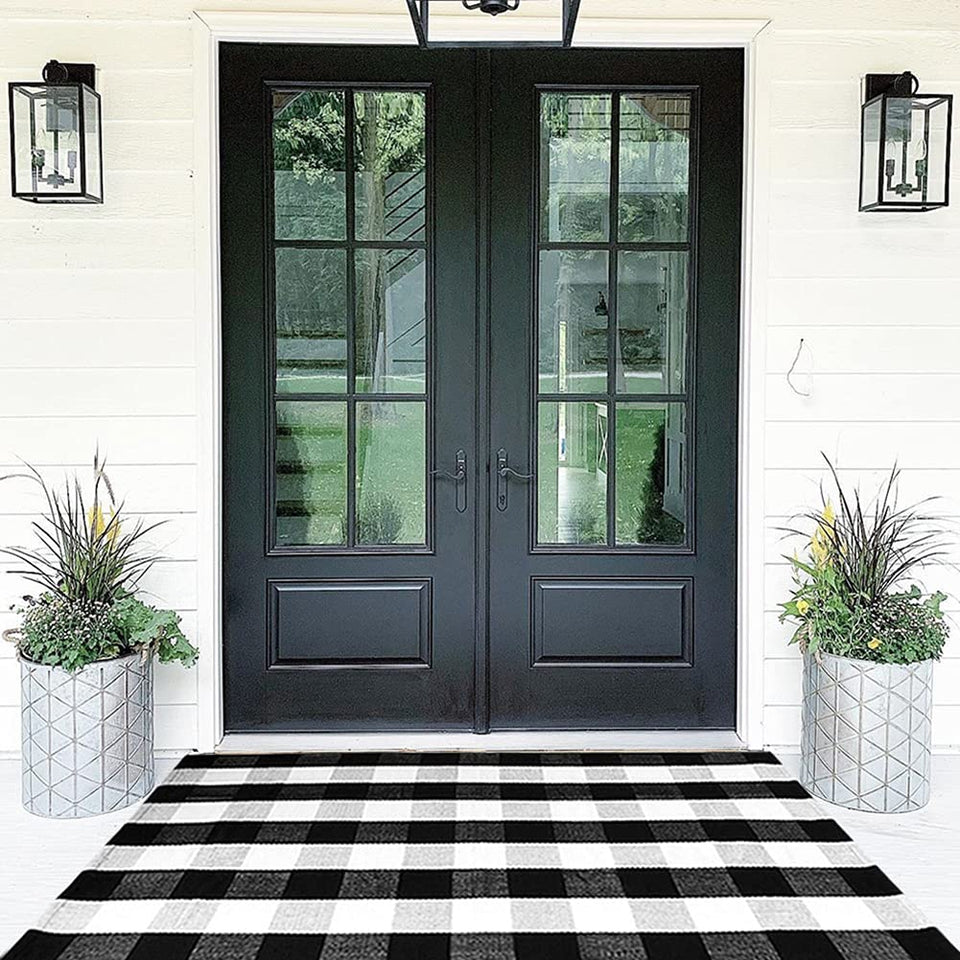 CAINANEL Buffalo Plaid Outdoor Rug on front porch for stylish, durable entry