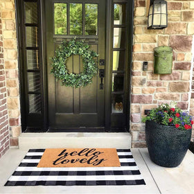 CAINANEL Buffalo Plaid Outdoor Rug in kitchen entry area with layered mat setup